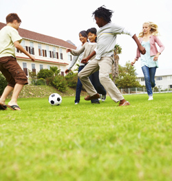 Kids playing soccer on field_250px.jpg