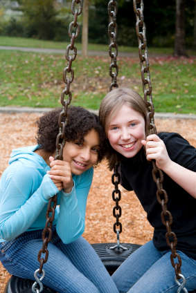 Girls on Swing istock