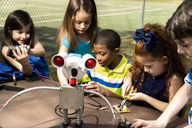 Science students with robot